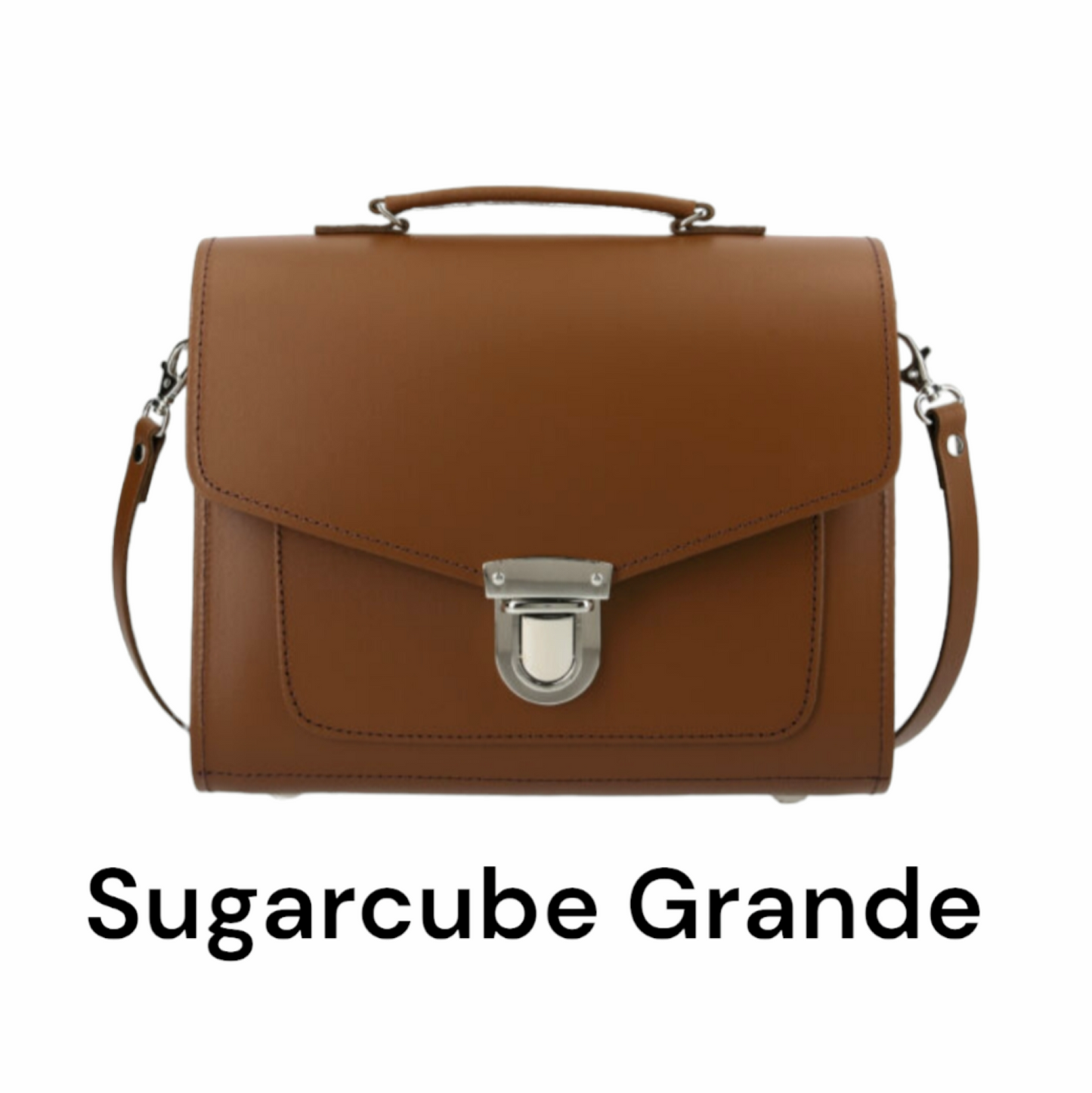 Versatile Sugarcube Handbag by Zatchels shown in a fashionable outfit ensemble, ideal for formal and casual occasions.