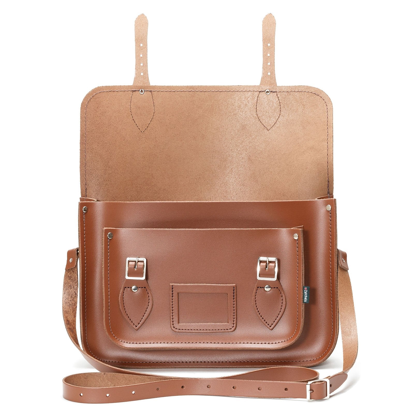 Handmade chestnut leather satchel showcasing elegant craftsmanship with adjustable strap, perfect for personalisation options.