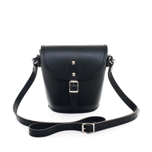 Stylish Handmade Black Leather Barrel Bag showcasing elegant craftsmanship with an adjustable strap, perfect for a unique luxury accessory.
