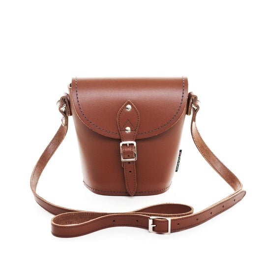 Luxurious Handmade Chestnut Leather Barrel Bag, showcasing rich chestnut hue and elegant craftsmanship, ideal for stylish outings.