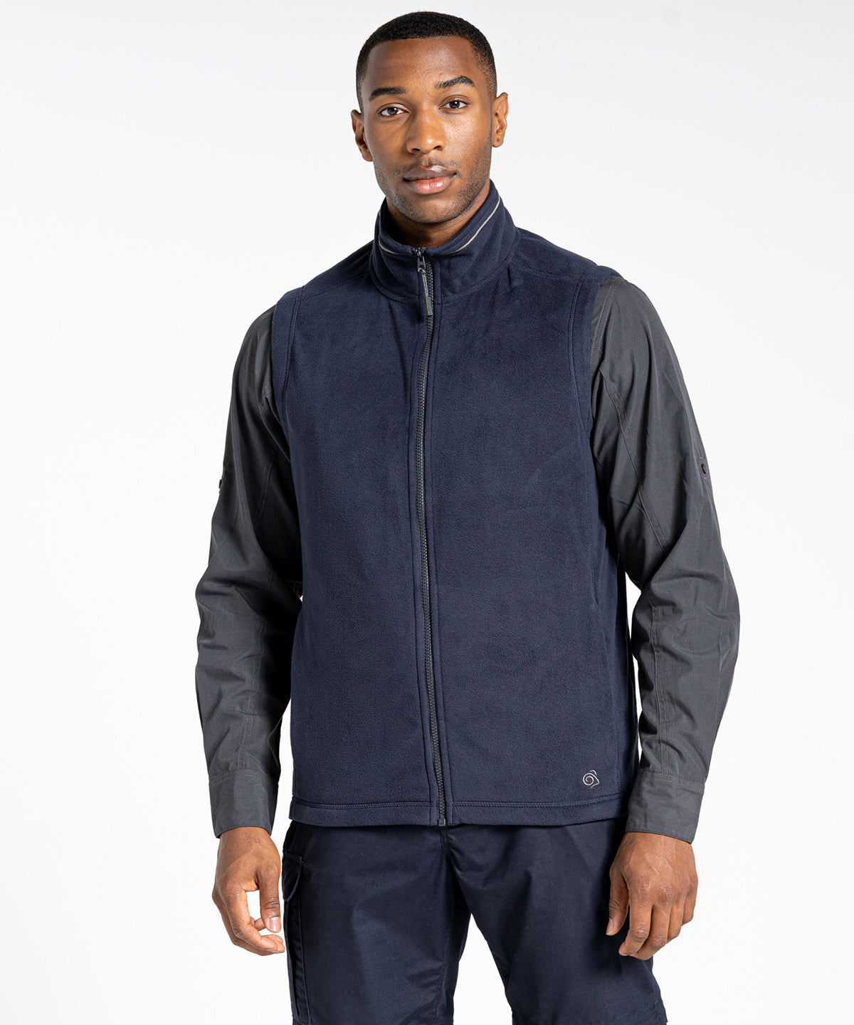 Chic overview of a fashionable fleece vest featuring dual zipped pockets and full front zip, representing luxury and sustainability in outerwear.