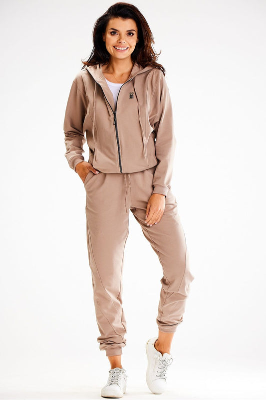 Elegant Awama zippered sweatshirt with side slide pockets and intricate detail, ideal for a chic, comfortable look in various sizes.