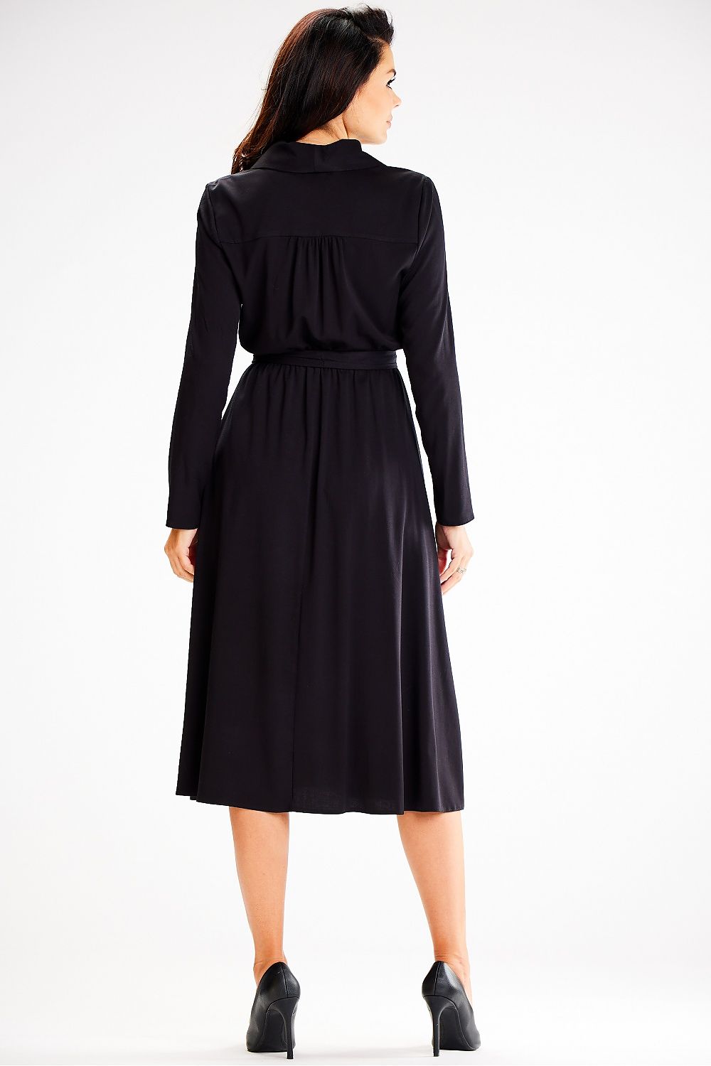 Fashionably styled Awama daydress on a model, highlighting its elegant silhouette.