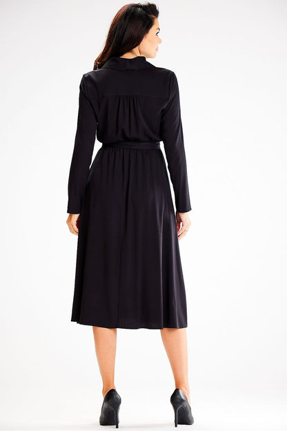Fashionably styled Awama daydress on a model, highlighting its elegant silhouette.