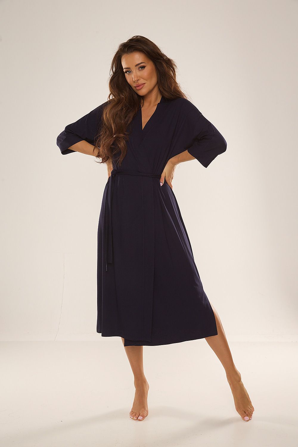 Model wearing the De Lafense Women's Viscose-Lycra Bathrobe, illustrating its flattering fit and comfortable 3/4 sleeve design.