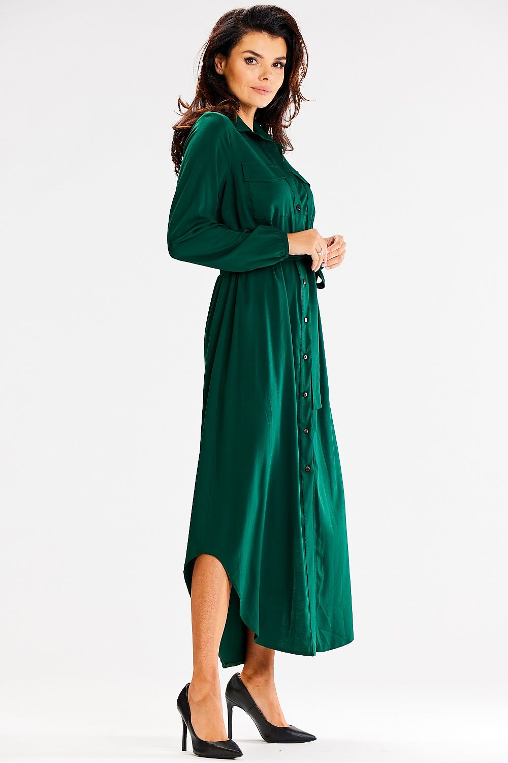 Stylish Awama maxi dress in a luxurious fabric, featuring long sleeves and a flattering waist tie for an exquisite look.