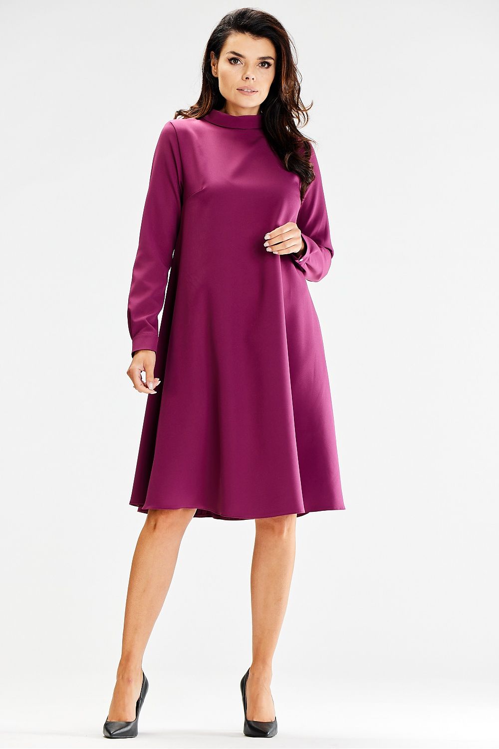 Model wearing the elegant loose trapezoidal daydress with half turtleneck by Awama, exuding a chic and timeless style perfect for various occasions.