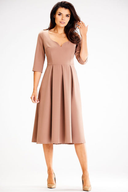 Sophisticated Awama Daydress showcasing a fitted top and flowing skirt, tailored for the modern woman.