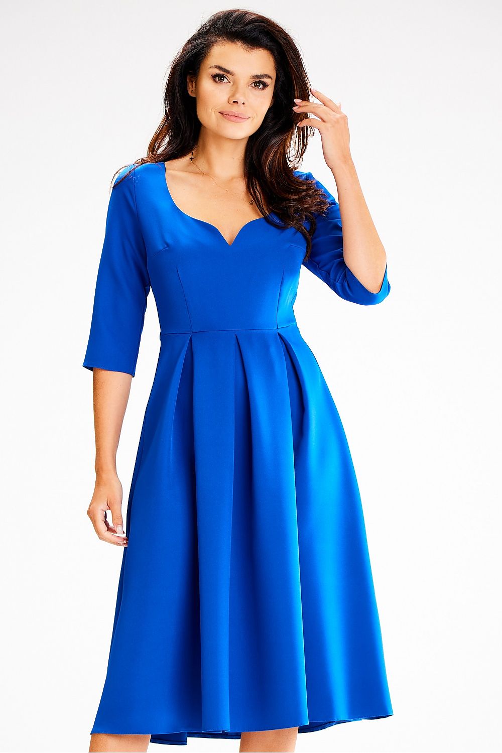 Elegant Awama Daydress showcasing a unique neckline and flared design, perfect for enhancing feminine curves.