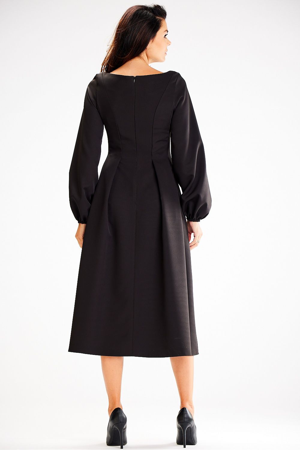 Full view of the Awama Midi Blouson Dress, demonstrating its midi length and fitted top, a choice for elegance in any wardrobe.