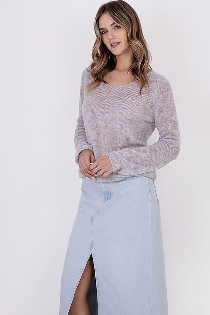 MKM lightweight transparent sweater featuring elegant raglan sleeves, perfect for minimalist layering in luxury fashion.