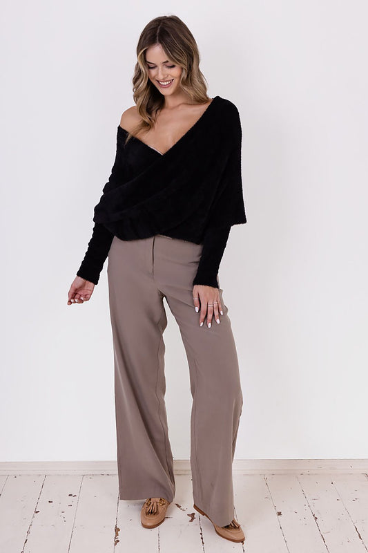 Elegant MKM Bristle Yarn Jumper Sweater, showcasing a stylish deep neckline and adaptable sleeve styles for a chic look.