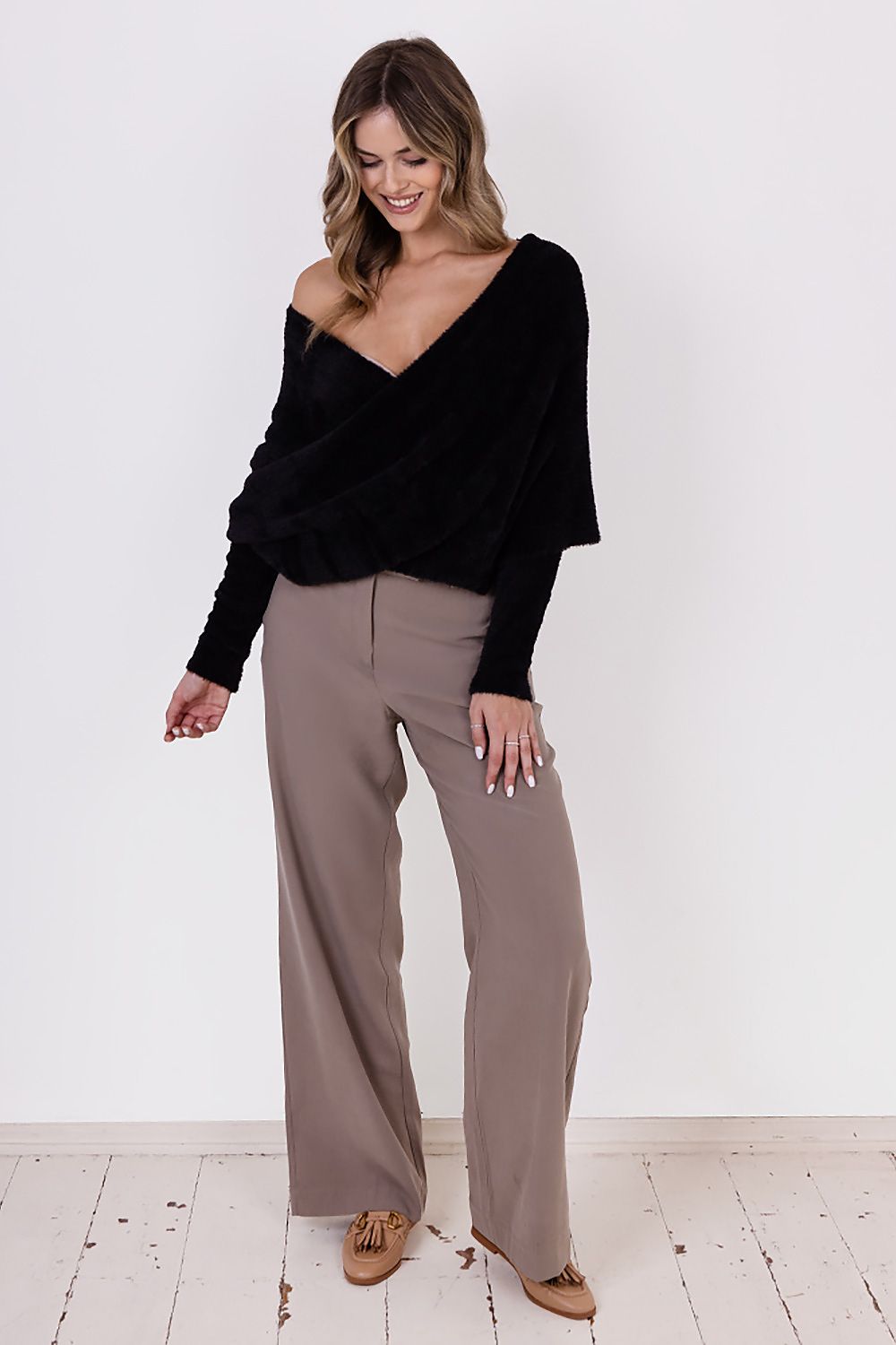 Elegant MKM Bristle Yarn Jumper Sweater, showcasing a stylish deep neckline and adaptable sleeve styles for a chic look.