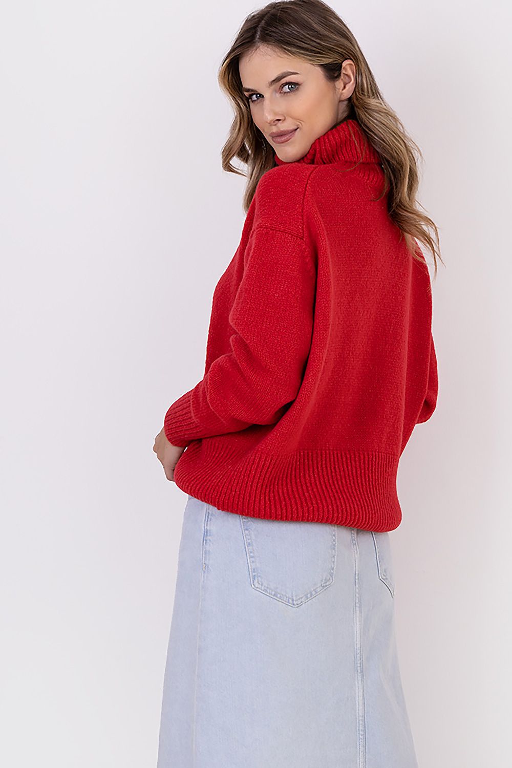 MKM Elegant Soft Turtleneck Sweater styled with denim, showcasing versatility for every occasion.