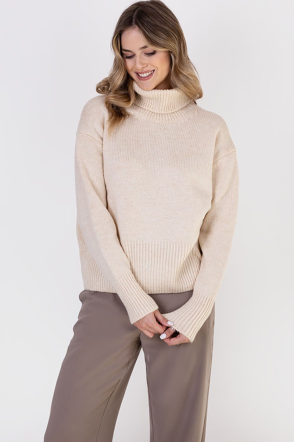MKM Elegant Soft Turtleneck Sweater in a soft, warm fabric, ideal for layering during chilly seasons with a touch of sophistication.
