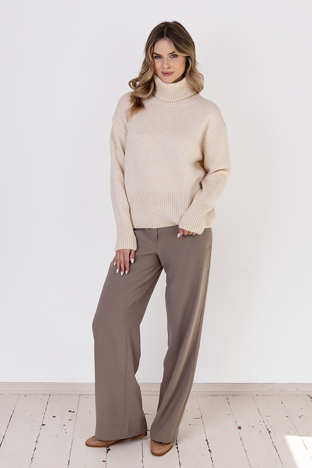MKM Elegant Soft Turtleneck Sweater in a stylish display, highlighting its casual cut and ribbed trims, perfect for both casual and formal occasions.