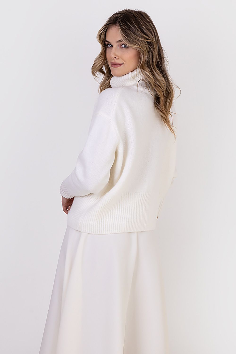 MKM Elegant Turtleneck Sweater in a minimalist design, ideal for chic styling in varied settings.