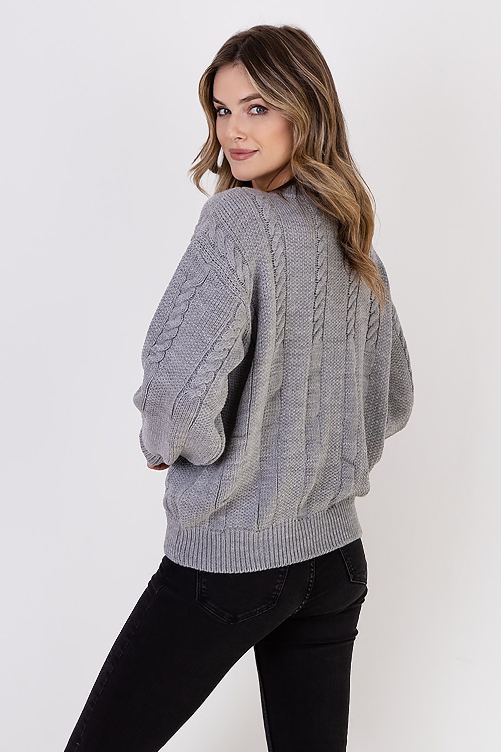 Close-up of MKM women's luxurious wide sleeve jumper showcasing high-quality wool blend material and vertical half-quartz pattern in an elegant design.