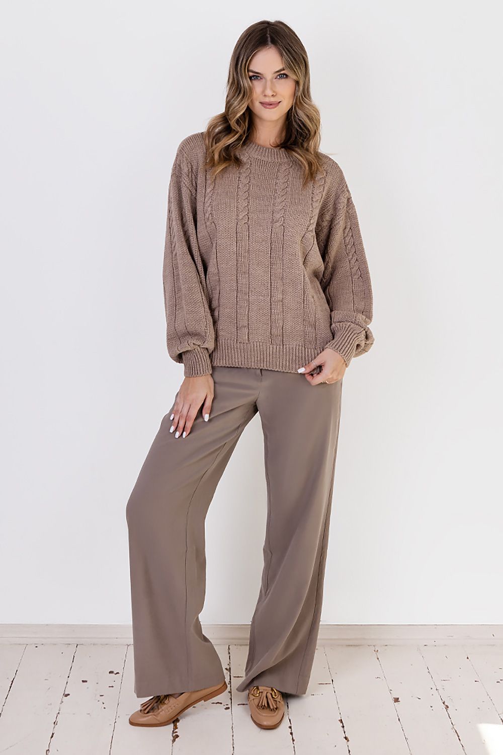 Fashionable MKM women's jumper with wide sleeves and a striking vertical half-quartz pattern, made from a premium wool blend that embodies luxury and comfort.
