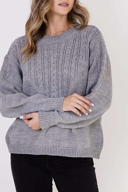 Elegant MKM Plaid Jumper Sweater in a slimming sporty silhouette, combining traditional plaid patterns with delicate braids for a sophisticated look.