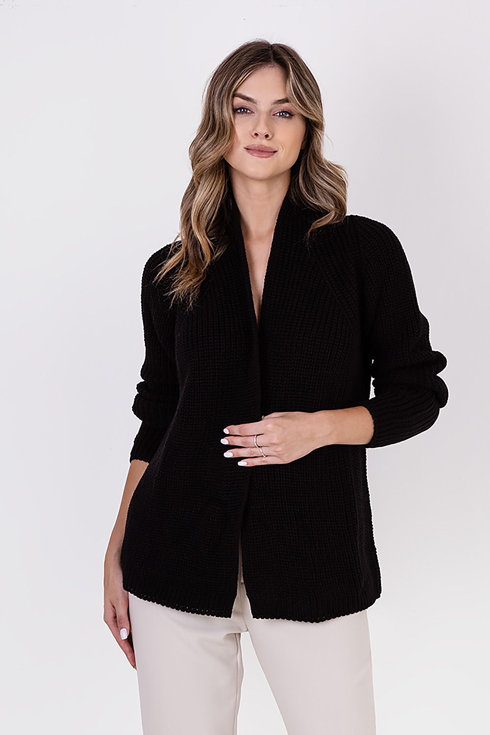 MKM ribbed cardigan displayed on a model, illustrating its versatility for both formal and casual wear.