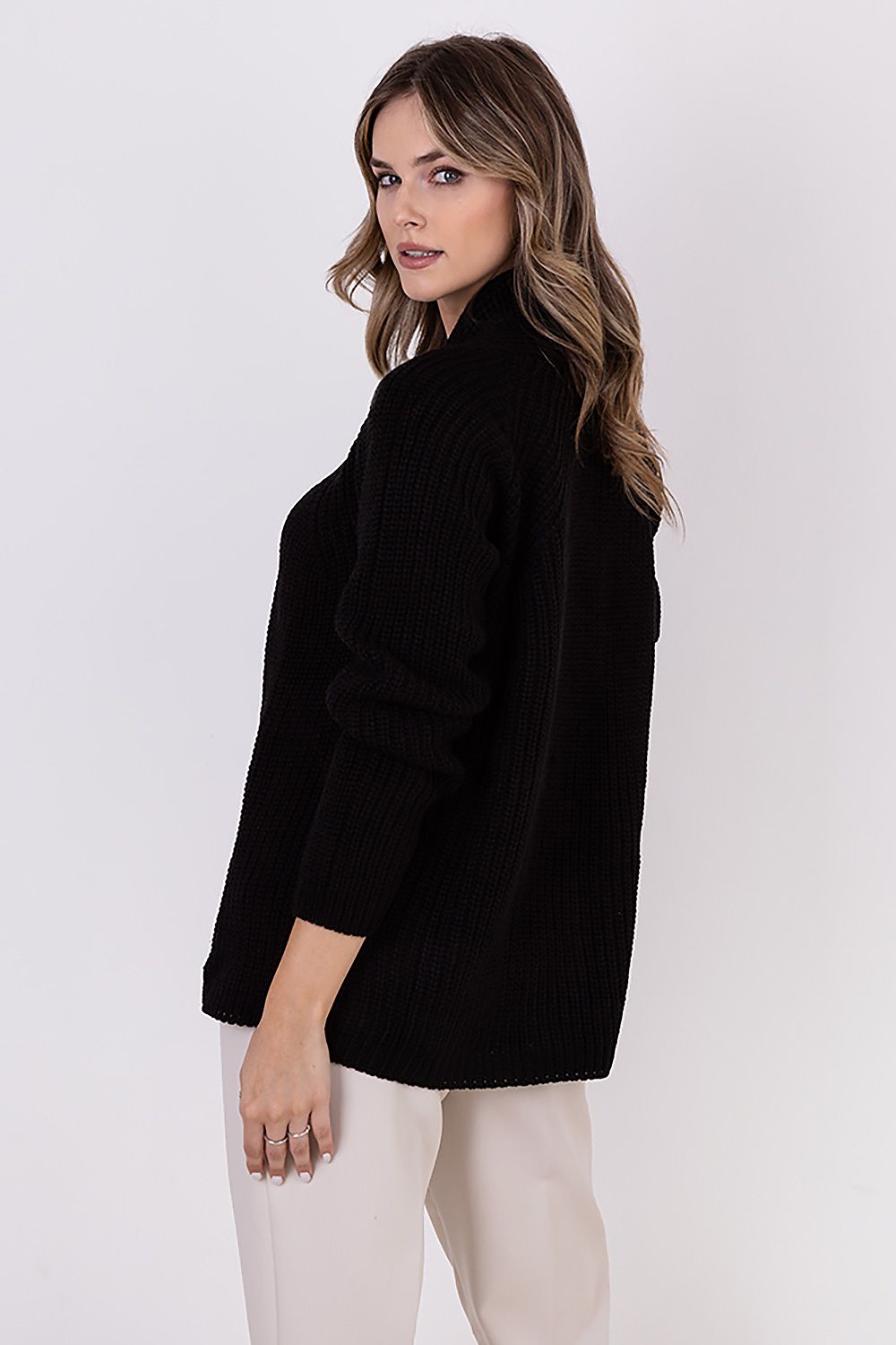 Shopping flat lay of MKM ribbed cardigan, emphasizing the elegant design and soft texture for chic winter looks.