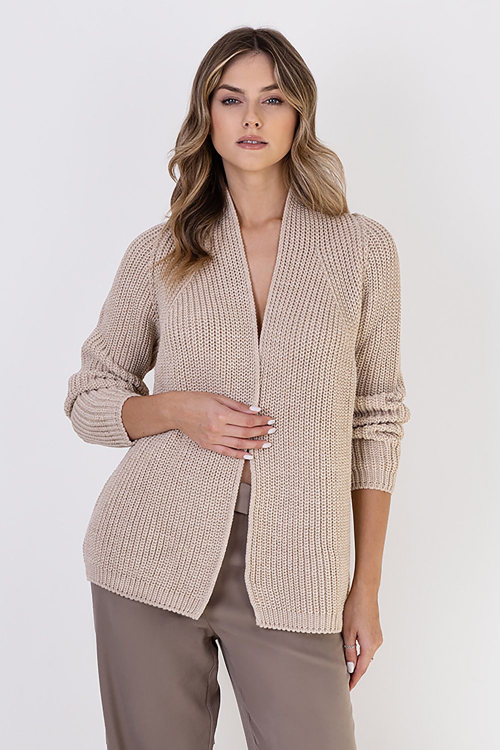 Detail of MKM ribbed cardigan's stand-up collar, highlighting luxury and sophistication in winter fashion.