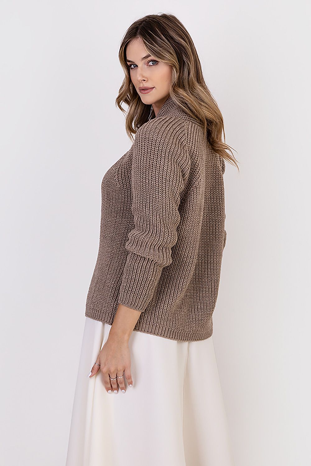 Models displaying the MKM ribbed cardigan with stand-up collar, designed for sophisticated and casual wear, crafted from a soft wool blend.