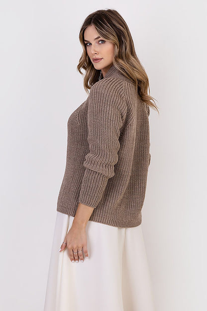Models displaying the MKM ribbed cardigan with stand-up collar, designed for sophisticated and casual wear, crafted from a soft wool blend.
