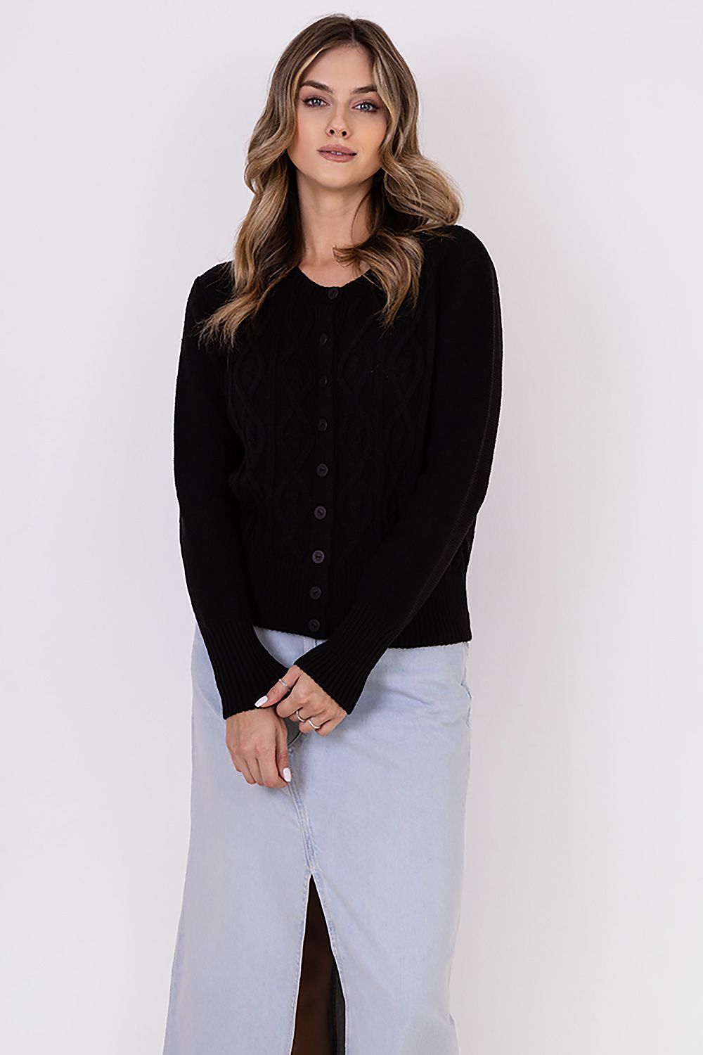 MKM luxurious cardigan in a sophisticated setting, emphasising its stylish design and premium fabric blend for ultimate comfort.