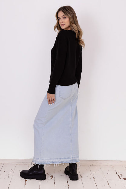 MKM elegant cardigan detailed with decorative weaves, perfect for layering in both casual and formal outfits.