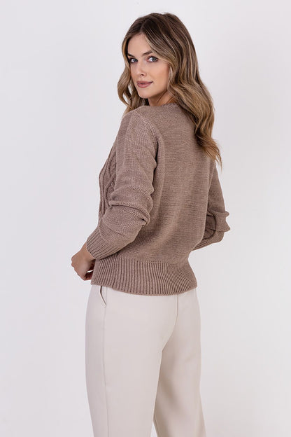 Flat lay of MKM elegant hip-length cardigan in soft shades, emphasizing its unique character and premium fabric blend of acrylic and wool.