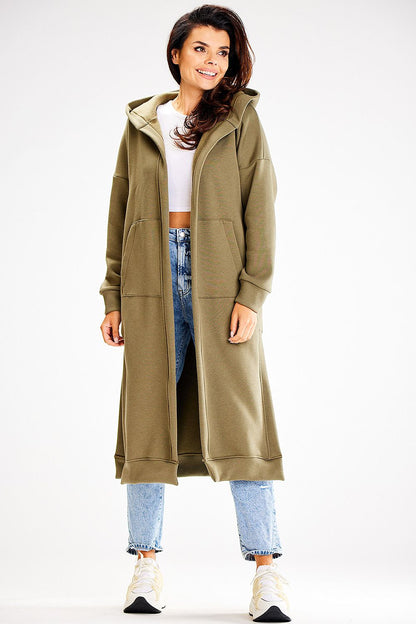 Elegant Awama sweatshirt with side slits, designed for ultimate comfort, showcasing a chic loose fit and modern hood.