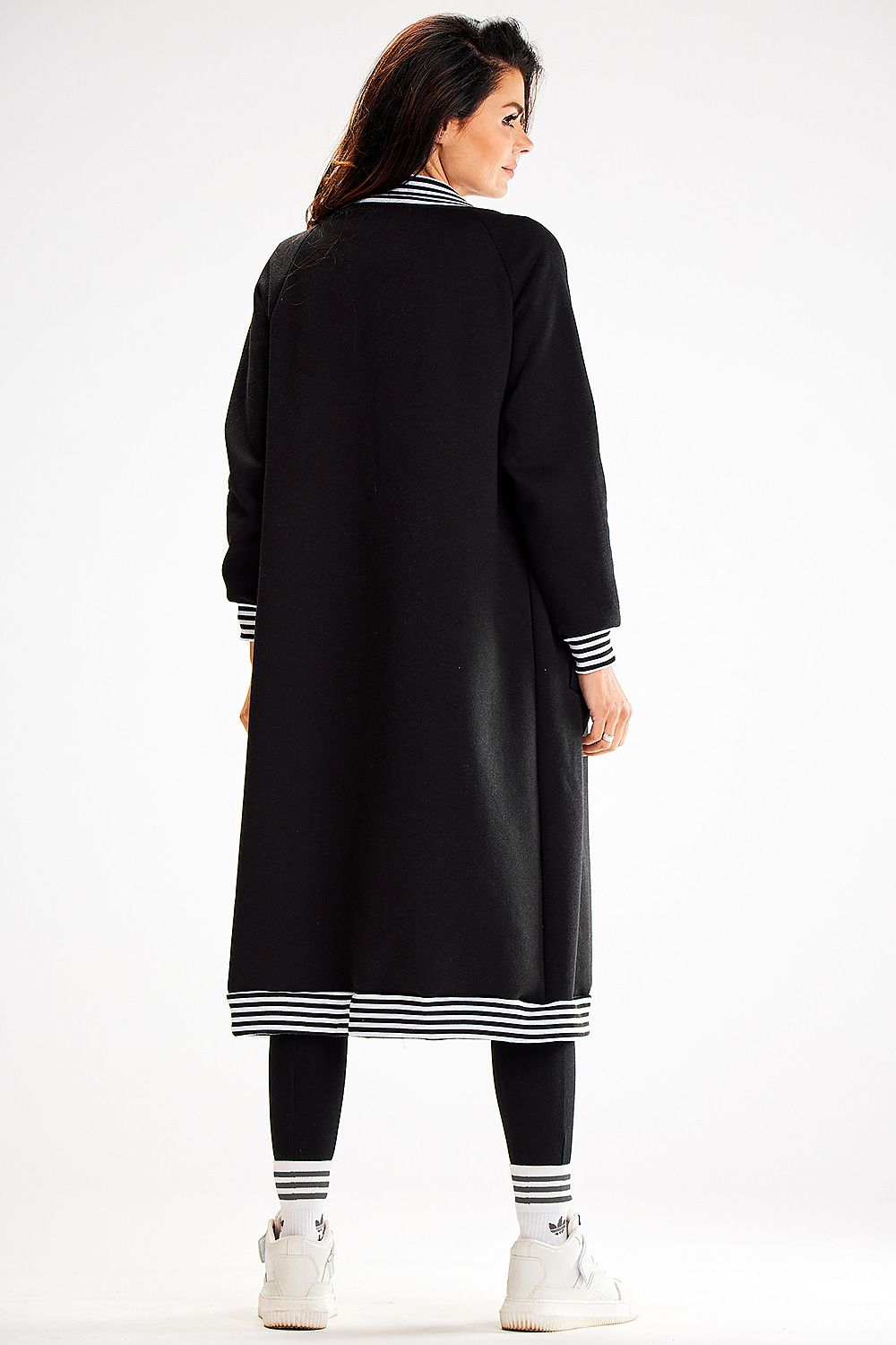 Close-up of the decorative striped ribbing detail on the long sweatshirt by Awama, reflecting luxury craftsmanship.