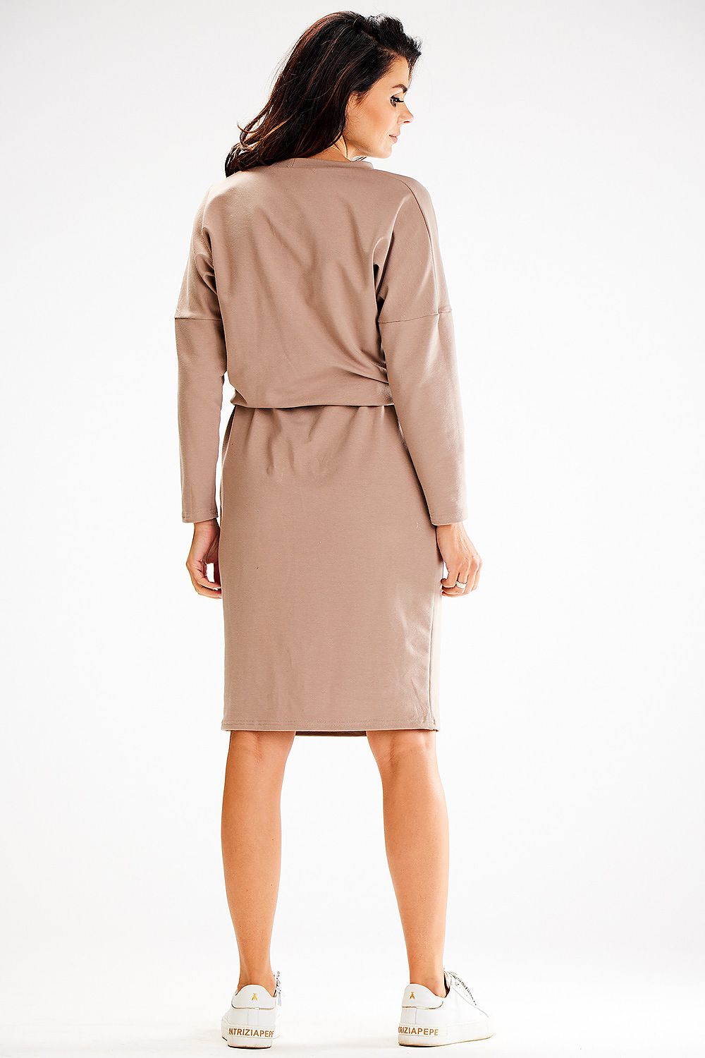 Front view of Awama's elegant loose daydress with pockets and intricate applique design.