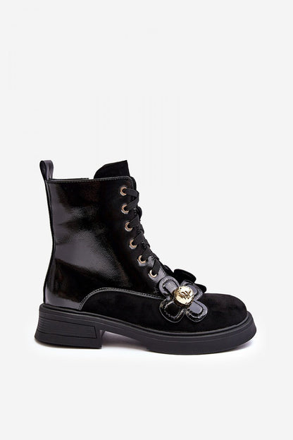 Step in style luxury women's boots in eco-friendly leather, with insulated interior and stylish floral decorations.