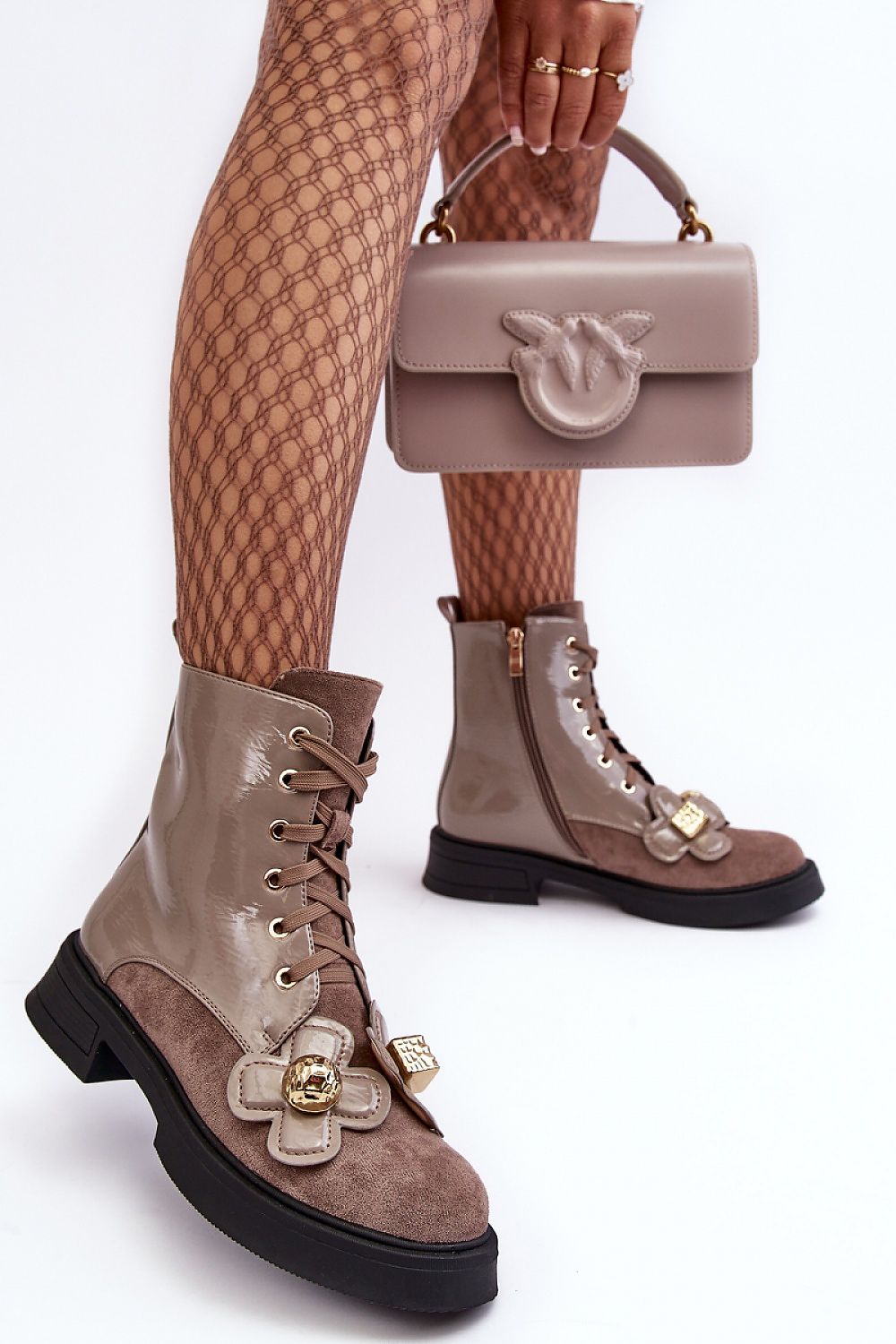 Elegant women's eco leather boots from Step in style, showcasing intricate floral details and a convenient side zipper for easy wear.