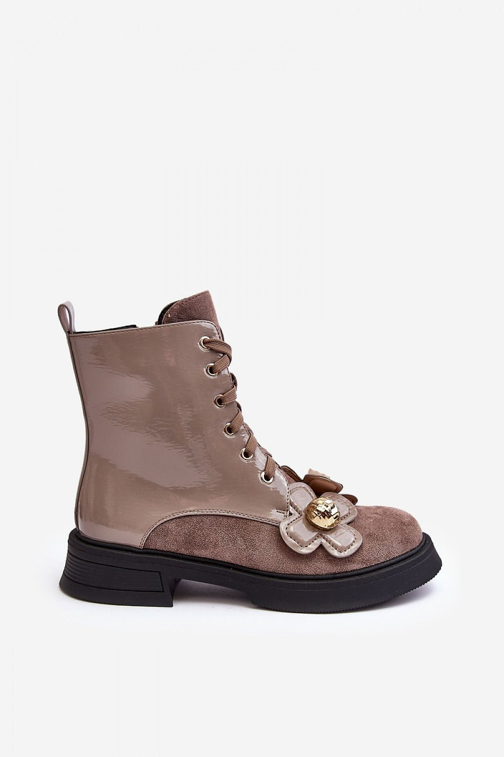 Step in style luxury women’s boots adorned with fabric flowers, combining comfort and elegance in eco-friendly leather.