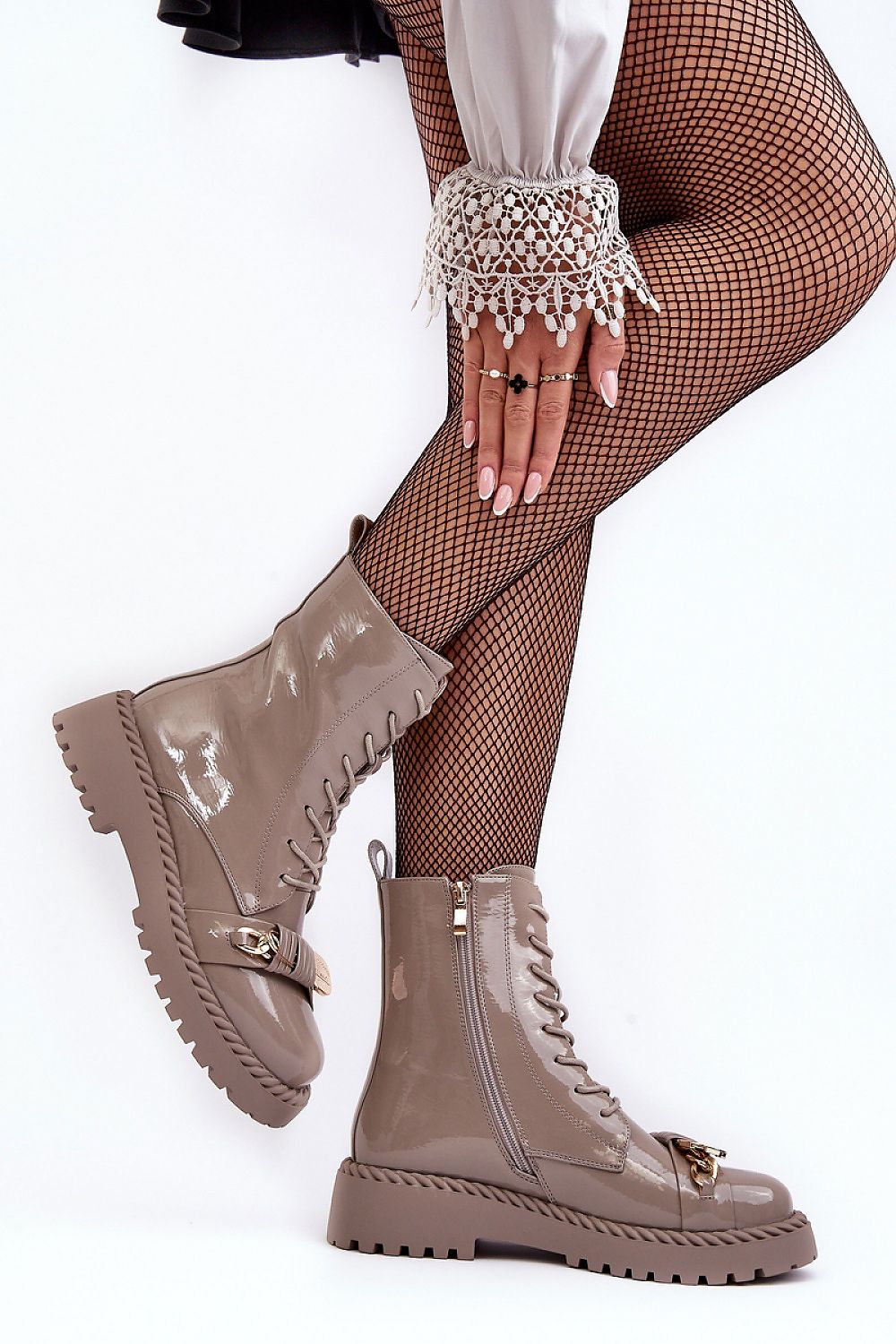 Elegant women's eco-leather bagger-style boots featuring a side zip and exquisite gold ornaments, designed by Step in Style, with a comfortable 5 cm heel.