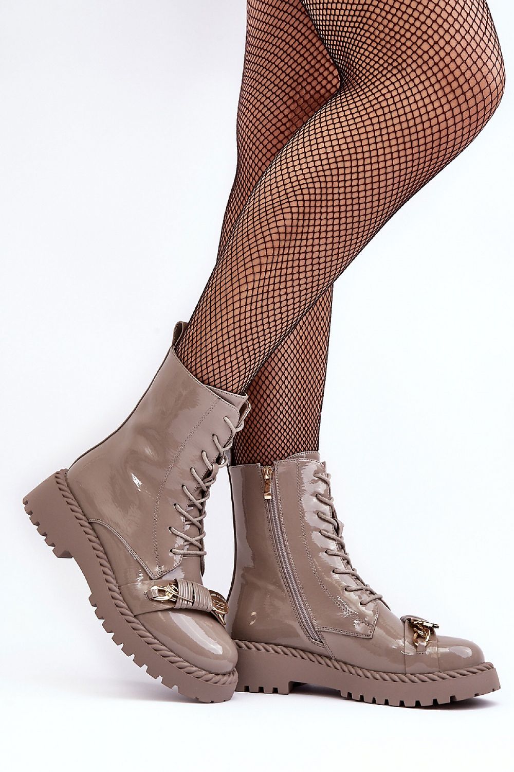 Chic women's eco-leather boots with a sleek side zip and luxurious gold accents, perfect for various stylings, by Step in Style.