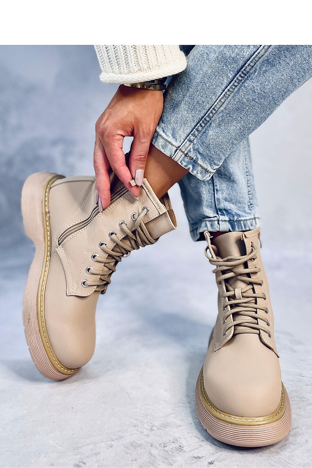 Sophisticated Women's Lace-Up Trapper Boots from Inello, crafted from eco-friendly leather and designed with a convenient side zipper for easy wear.