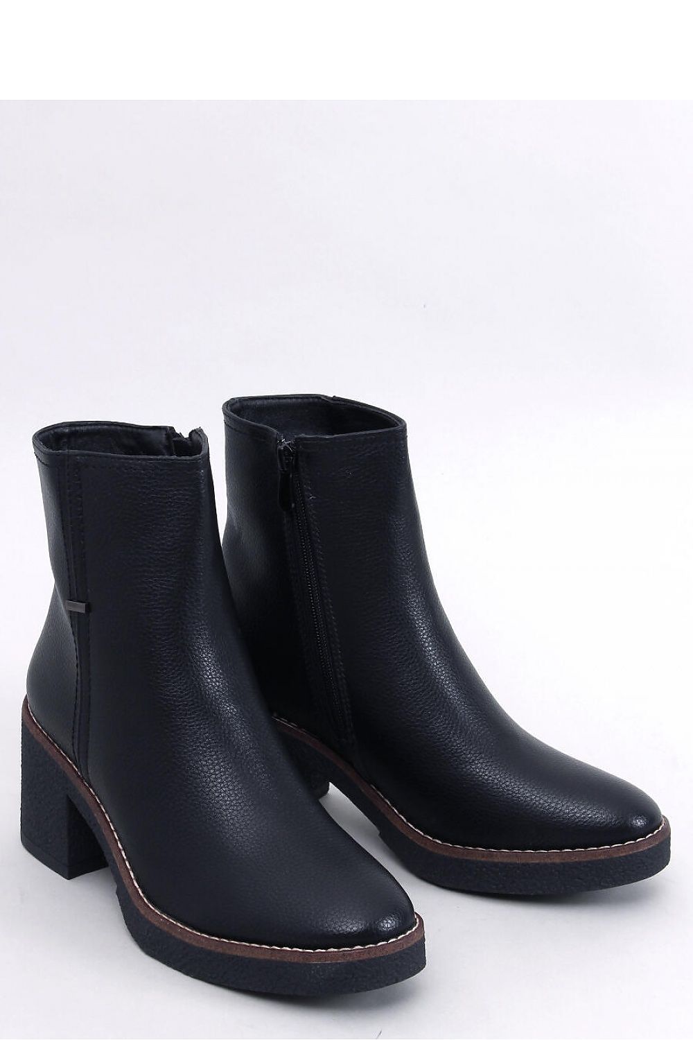 Inello Women's Classic Heel Boots featuring 7 cm rubber heel, crafted from organic leather with a luxurious soft fur lining, showcasing a timeless rounded toe design.