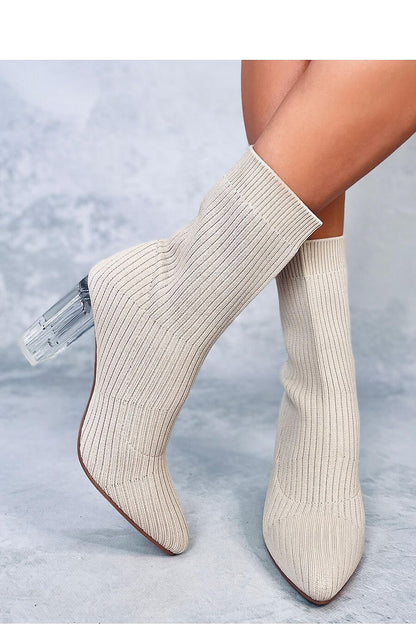 Luxurious sock boots for women from Inello with a stylish transparent heel and fashionable almond toe cut.