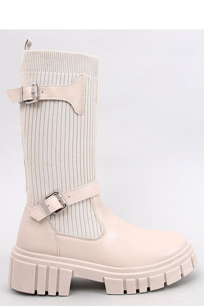 Luxury Inello Women's Officer Boots featuring a thick sole and minimalist sock-style design, adorned with elegant buckle straps, perfect for chic and contemporary fashion.