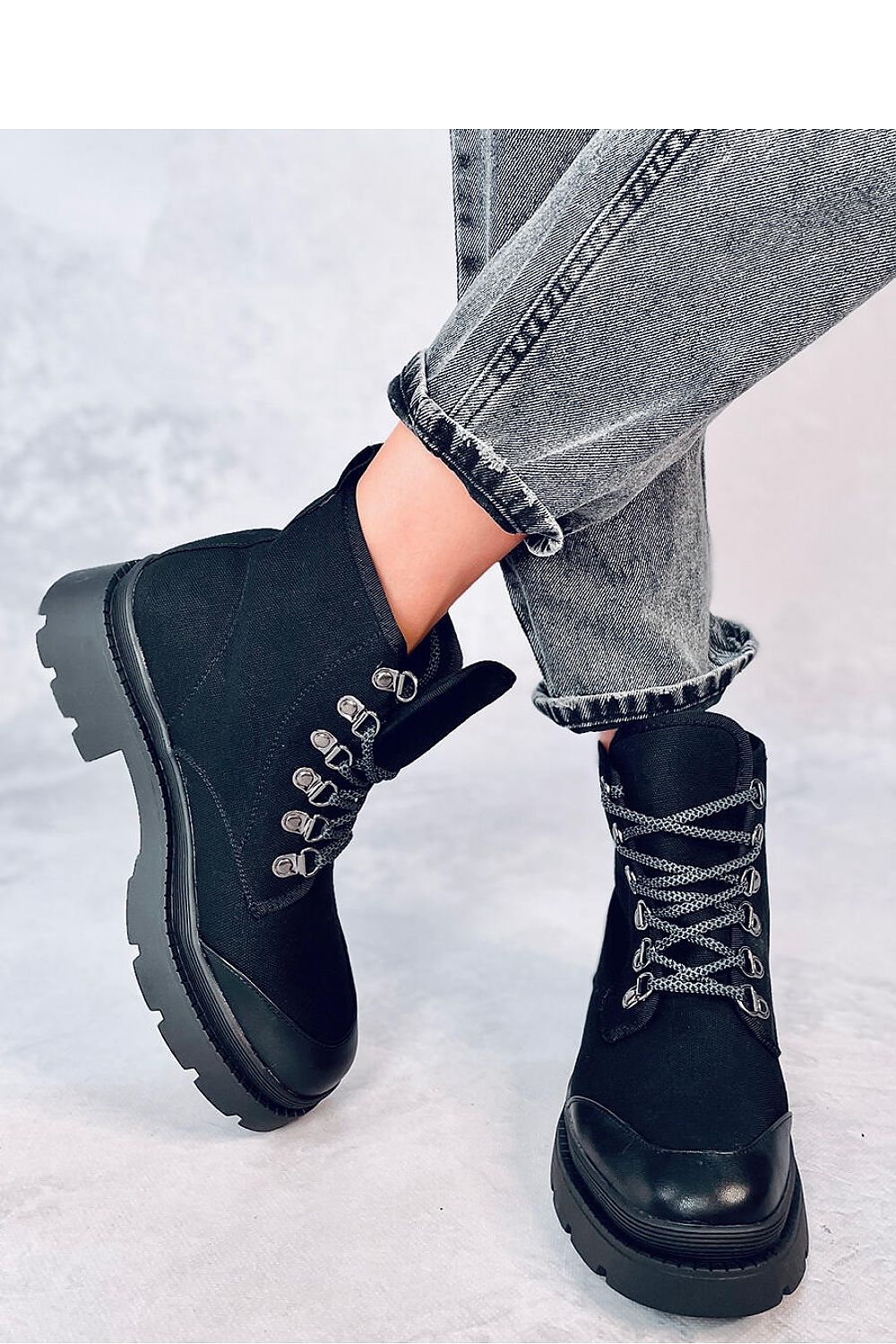 Stylish women's ankle trekking sneakers by Inello showcasing a fashionable high sole perfect for trekking and casual outings.