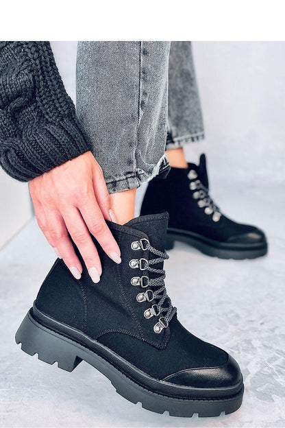 Elegant women's ankle trekking sneakers from Inello, featuring a unique cut and comfortable fabric for the fashion-forward adventurer.