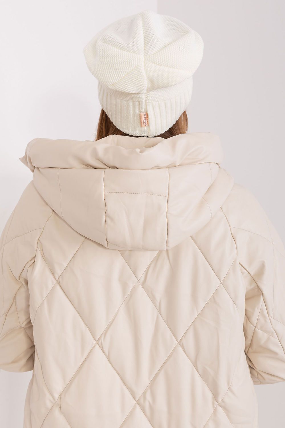 Stylish women's winter hat designed by Rue Paris, embellished with pearls for a sophisticated look.