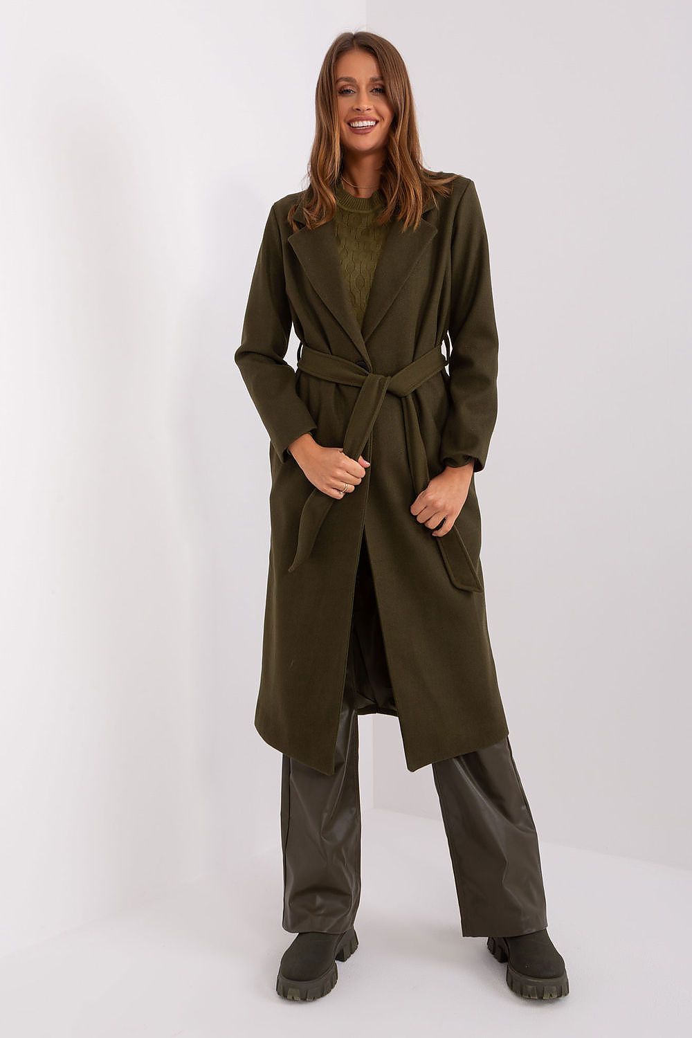 Close-up of the Och Bella long coat's sophisticated button closure and luxurious tie belt.