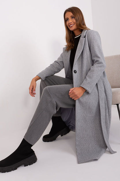 Elegant Och Bella Long Transitional Coat in durable polyester, featuring a chic button closure and stylish tie belt, perfect for both casual and formal occasions.