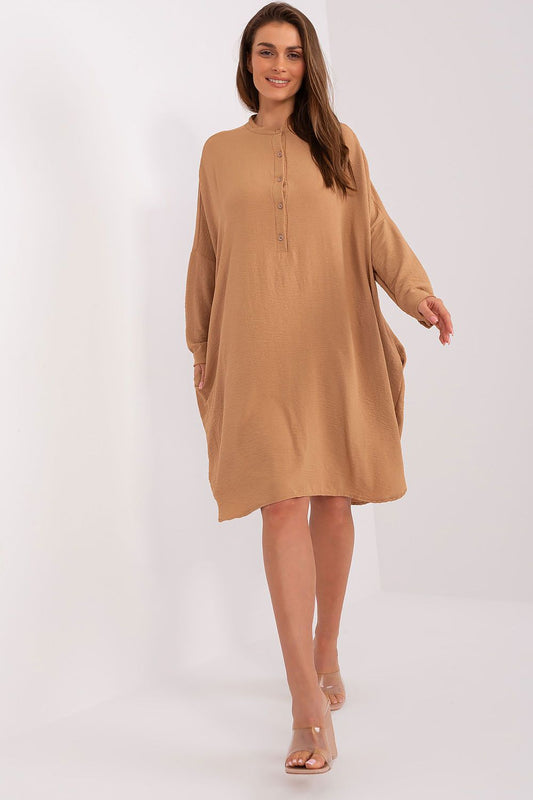 Italy Moda elegant loose fit buttoned shirt dress with long sleeves, featuring side pockets, perfect for stylish occasions.
